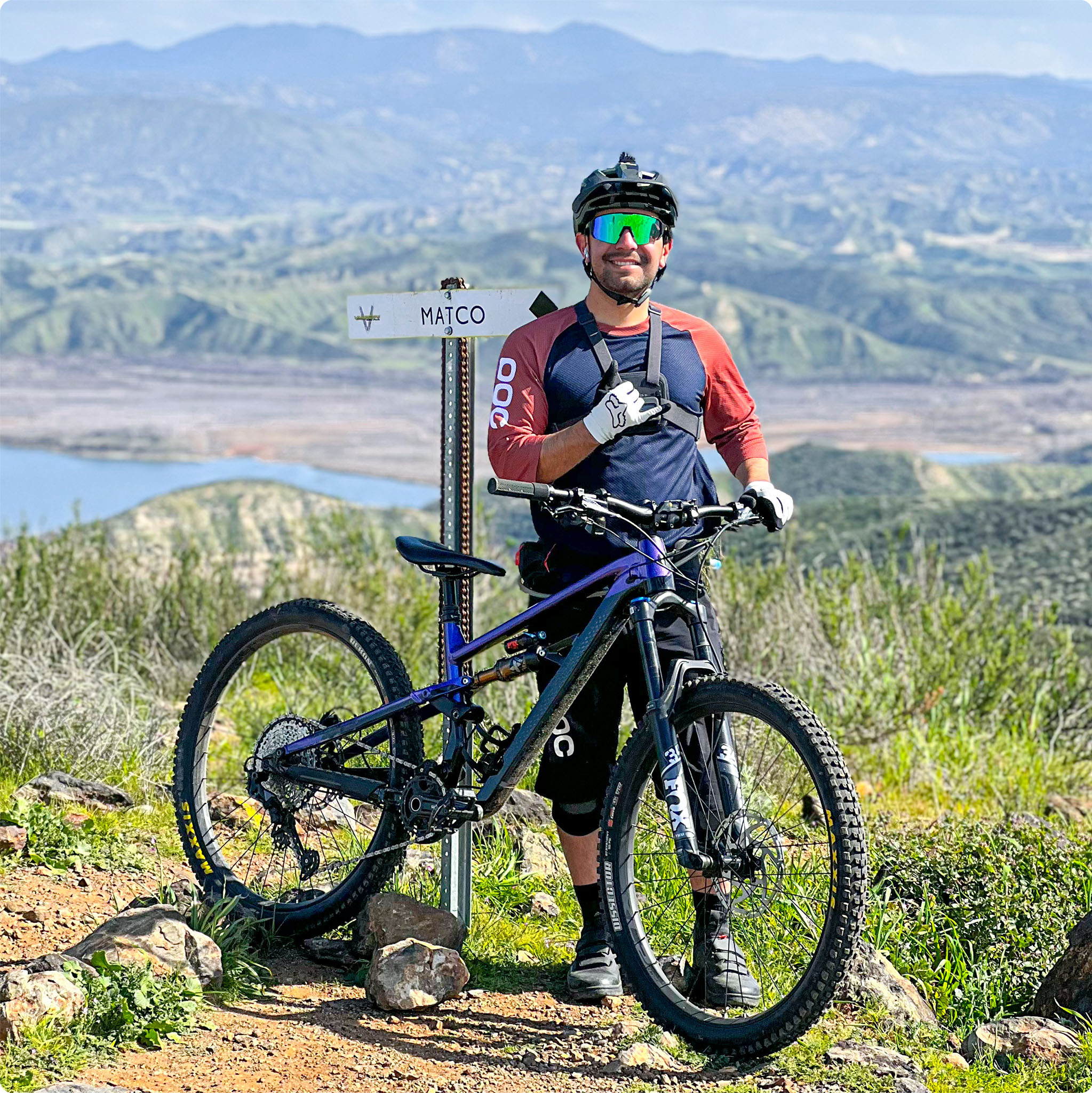 Rey with a mountain bike on a trail