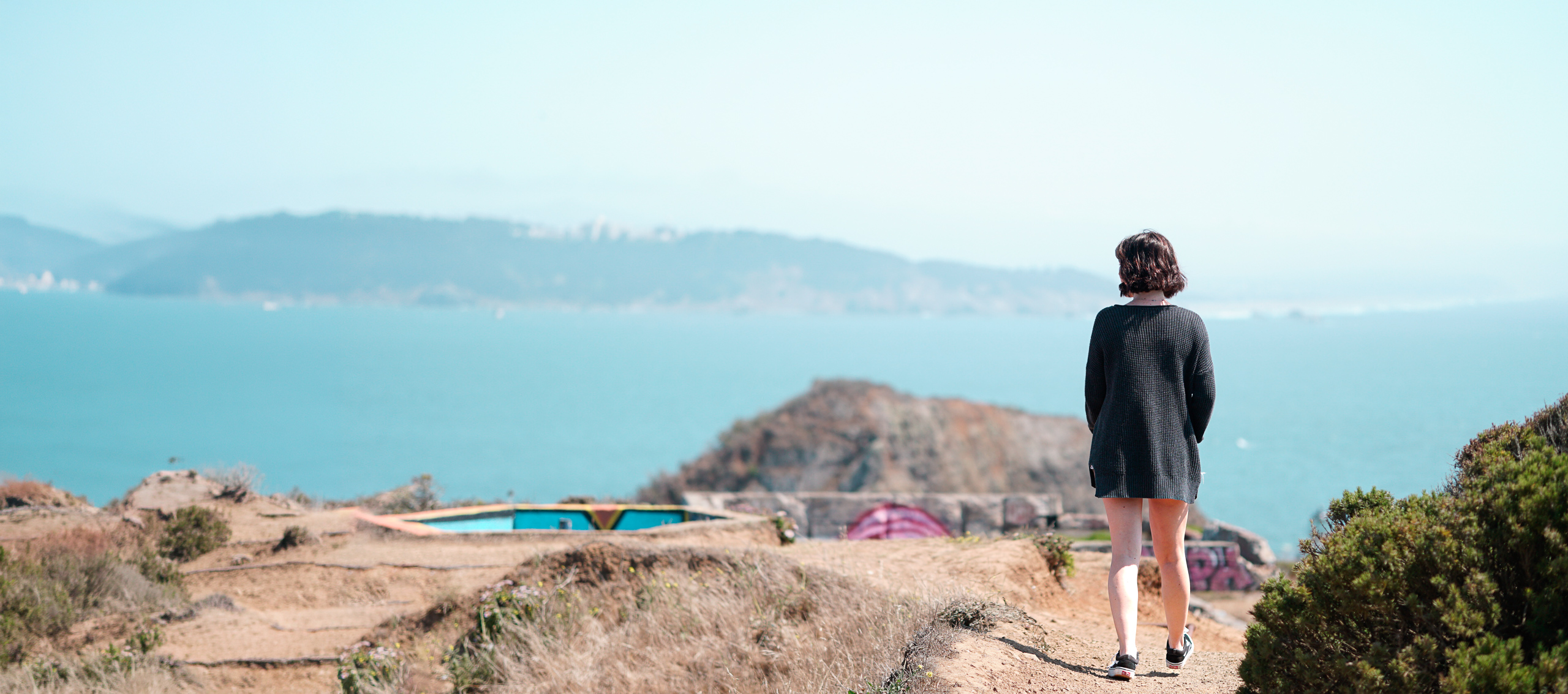 Person looking out over the coast